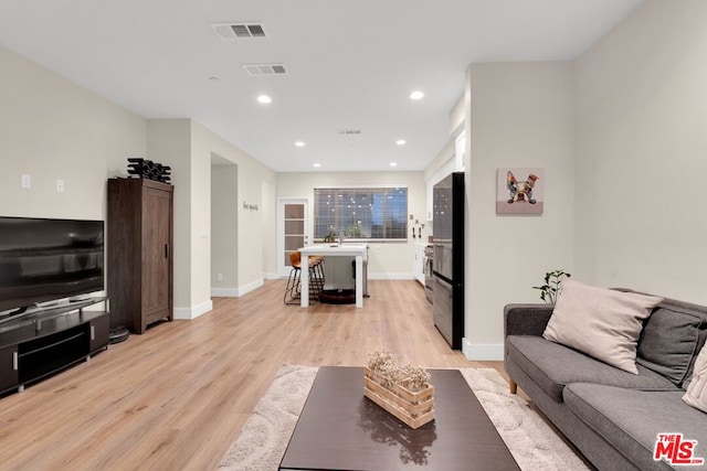 living room featuring light hardwood / wood-style floors