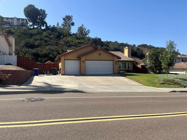 view of front of home featuring a garage