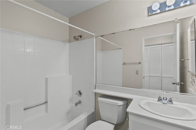 full bathroom featuring vanity,  shower combination, and toilet