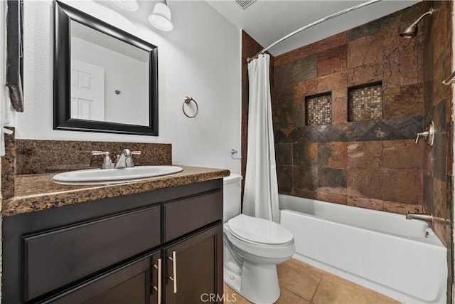 full bathroom featuring tile patterned floors, vanity, toilet, and shower / bath combo with shower curtain