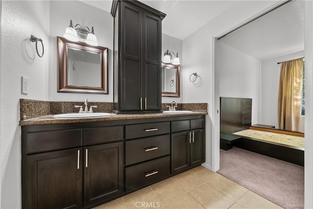 bathroom with vanity and tile patterned floors