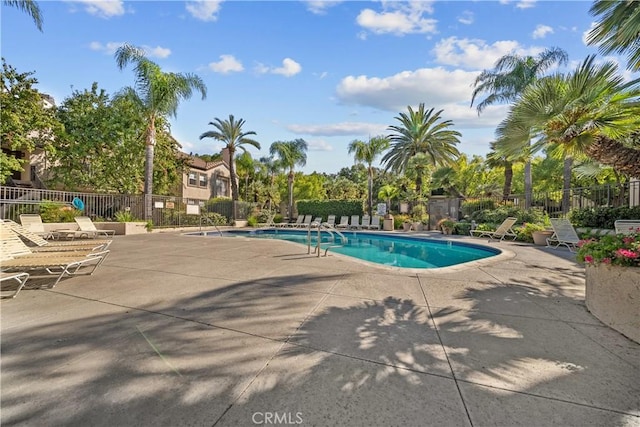 view of swimming pool featuring a patio