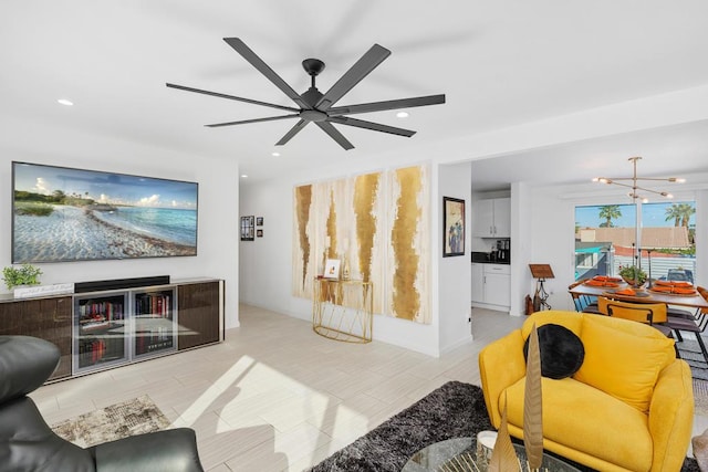 living room with ceiling fan with notable chandelier