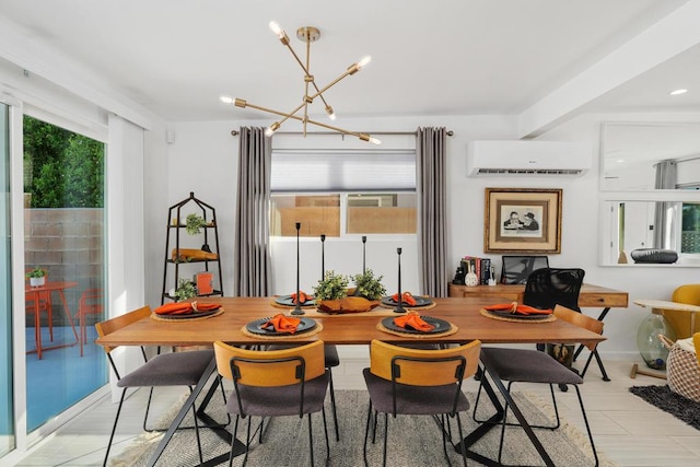 dining room with a notable chandelier, an AC wall unit, and a healthy amount of sunlight