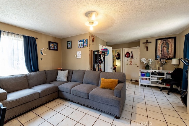 tiled living room with a textured ceiling