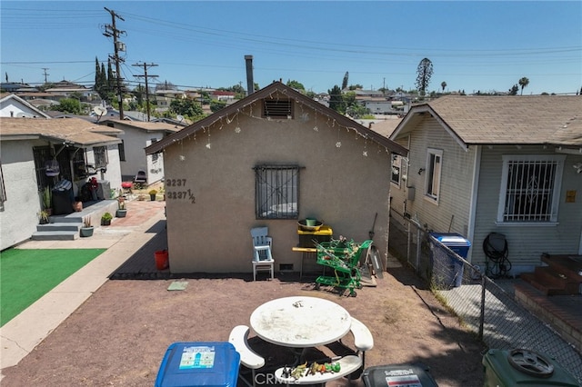 view of property exterior featuring a patio