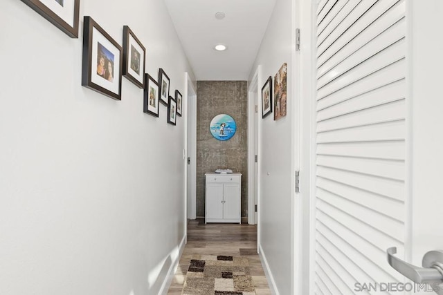 hallway featuring hardwood / wood-style flooring