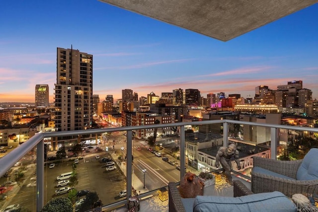 view of balcony at dusk