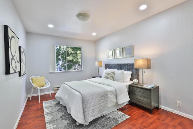 bedroom featuring dark hardwood / wood-style flooring