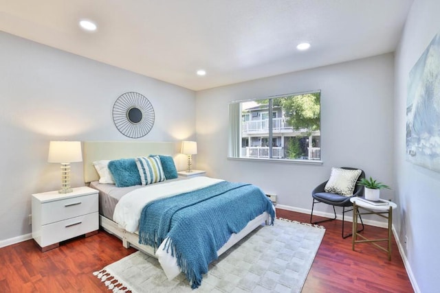 bedroom featuring dark hardwood / wood-style floors