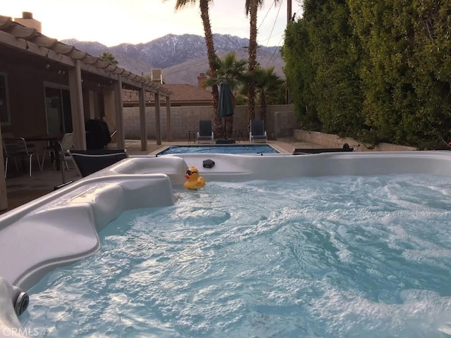 view of pool featuring a mountain view