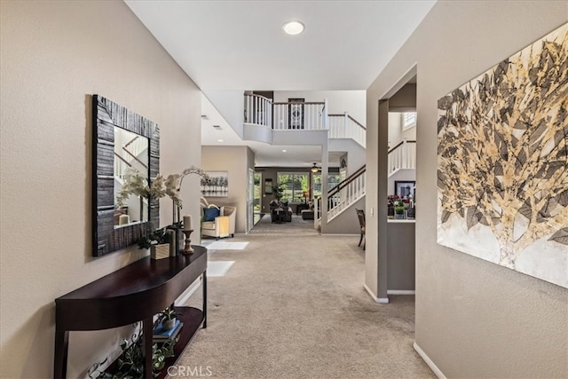 hallway featuring carpet flooring