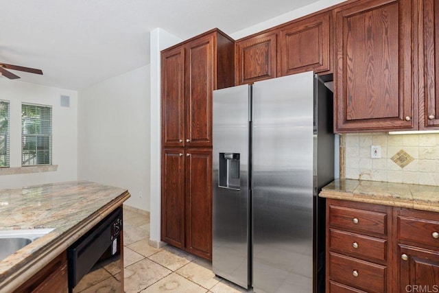 kitchen featuring tasteful backsplash, ceiling fan, light tile patterned flooring, black dishwasher, and stainless steel fridge with ice dispenser