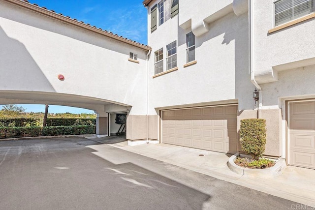 exterior space featuring a garage