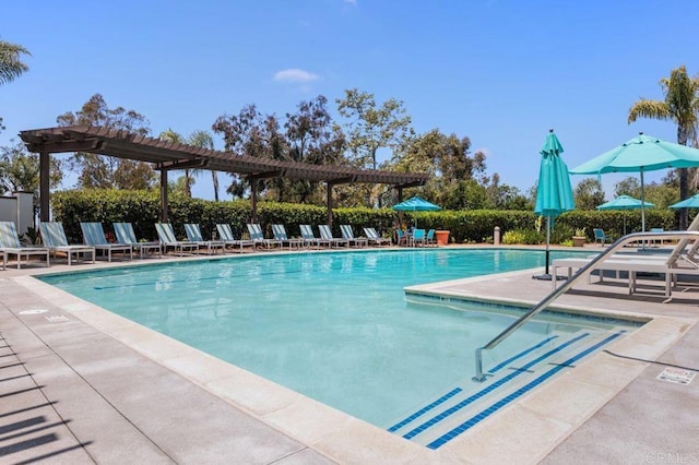 view of swimming pool with a pergola and a patio area