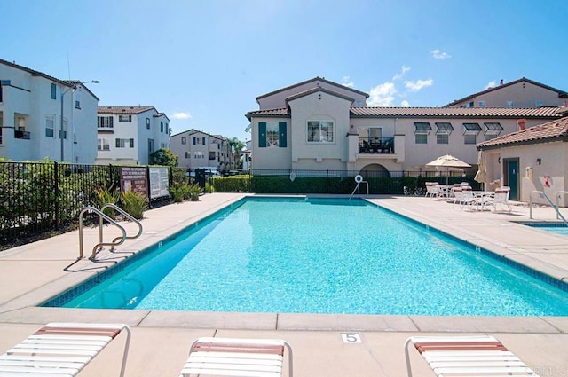 view of pool featuring a patio area