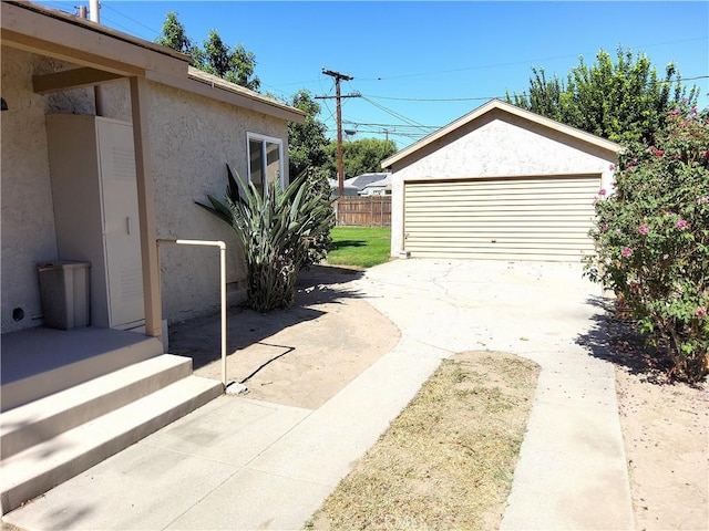 detached garage with fence