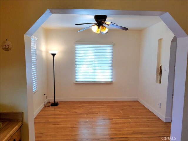 interior space featuring light wood-type flooring and ceiling fan