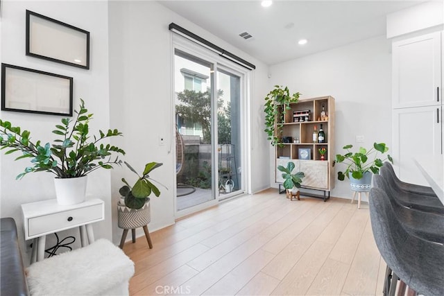 living area featuring light wood-type flooring