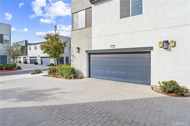 view of property exterior with a garage