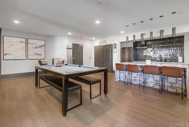 recreation room featuring wood-type flooring