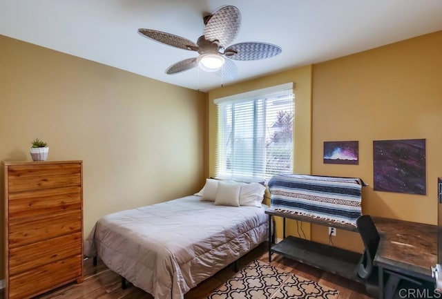 bedroom featuring hardwood / wood-style flooring and ceiling fan