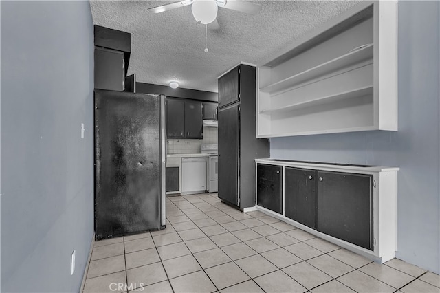 kitchen with decorative backsplash, stainless steel fridge, ceiling fan, light tile patterned floors, and white range oven