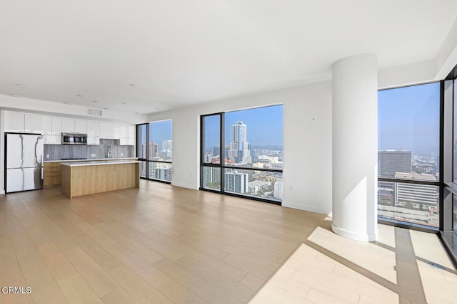 living room with light hardwood / wood-style floors