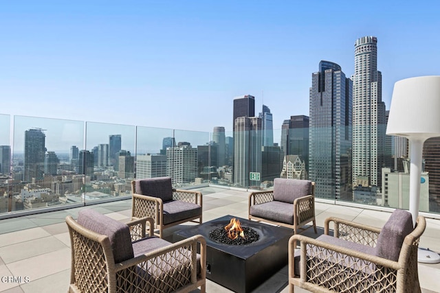 view of patio featuring an outdoor fire pit