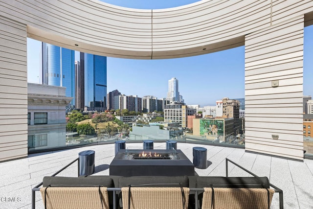 view of patio / terrace featuring a fire pit