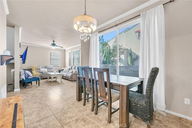 dining room featuring ornamental molding, light tile patterned flooring, and ceiling fan with notable chandelier