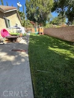 view of yard with a patio area