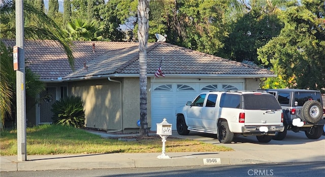 exterior space with a garage