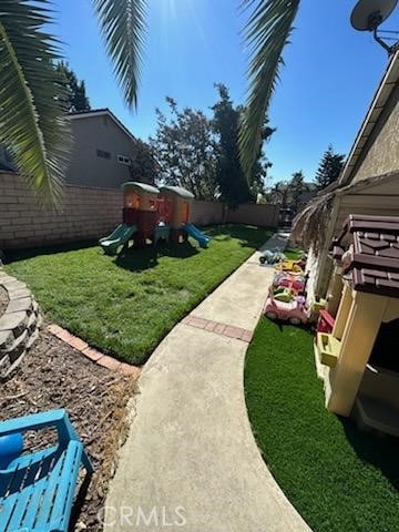 view of yard with a playground