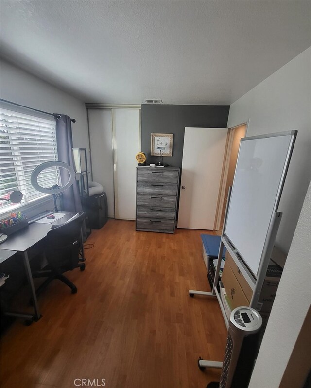 office featuring hardwood / wood-style flooring