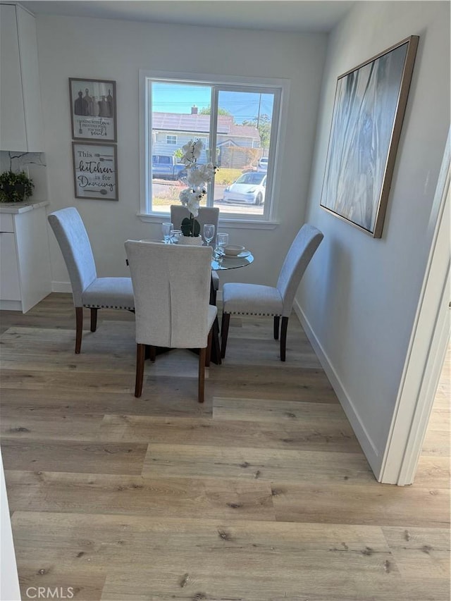 dining area featuring light hardwood / wood-style floors