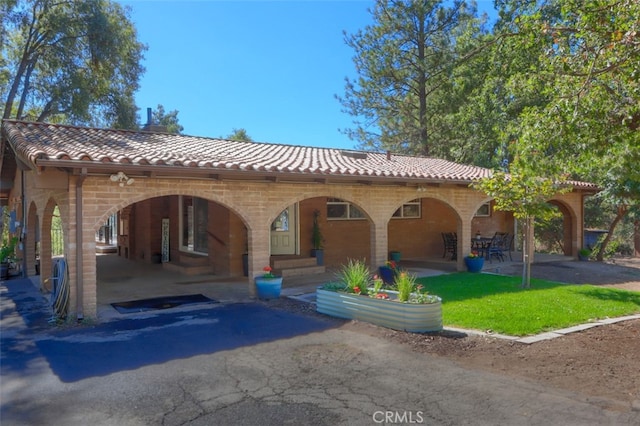 view of mediterranean / spanish house