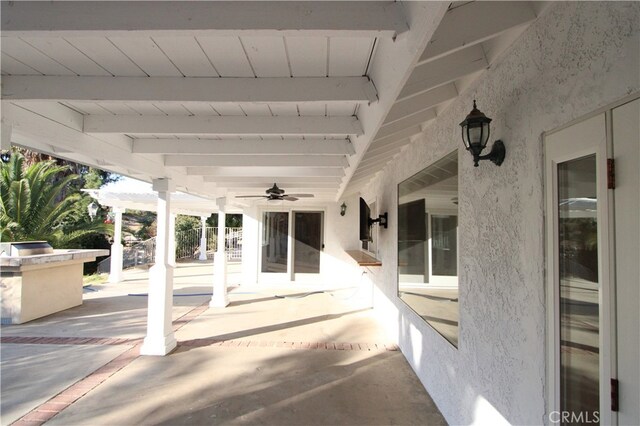 view of patio with ceiling fan