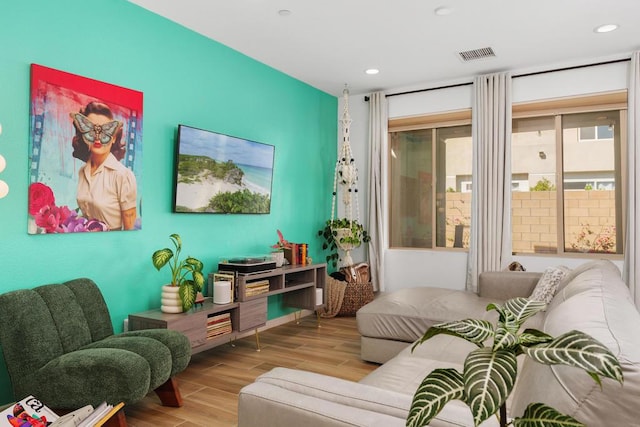 living area featuring light hardwood / wood-style floors