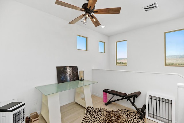 office area featuring ceiling fan and light hardwood / wood-style flooring