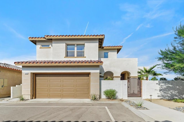 mediterranean / spanish-style house featuring a garage