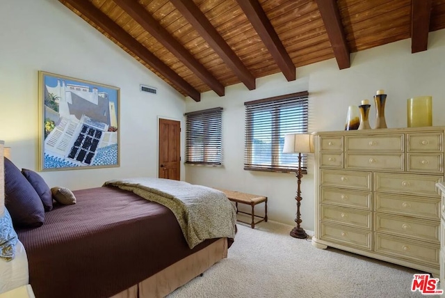 bedroom featuring light carpet, lofted ceiling with beams, and wooden ceiling