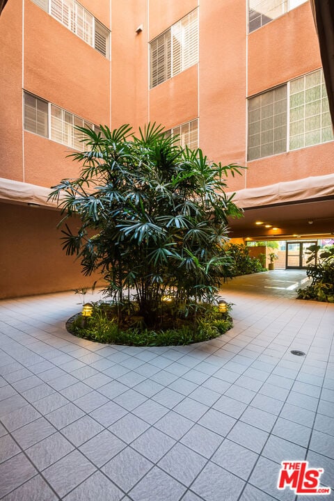 view of home's community featuring a patio area