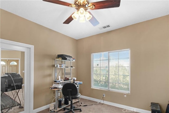 office with a wealth of natural light, carpet, and ceiling fan