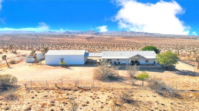 exterior space featuring a mountain view