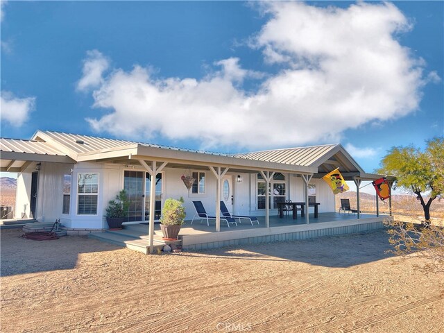 view of front of property with a patio area