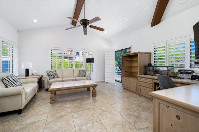 living room with beam ceiling, plenty of natural light, light tile patterned floors, and a textured ceiling