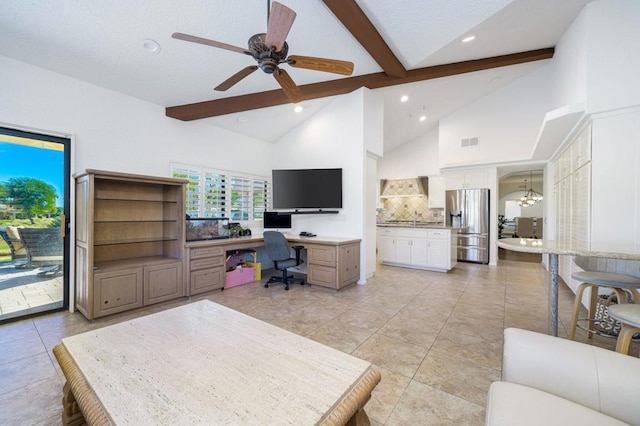 tiled office featuring sink, beamed ceiling, ceiling fan with notable chandelier, and high vaulted ceiling