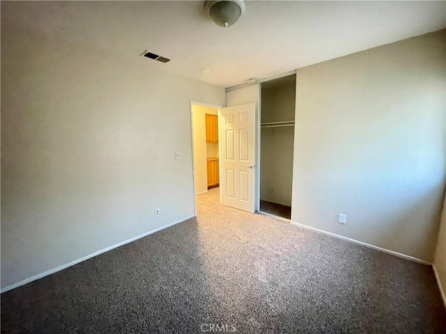 unfurnished bedroom with a closet