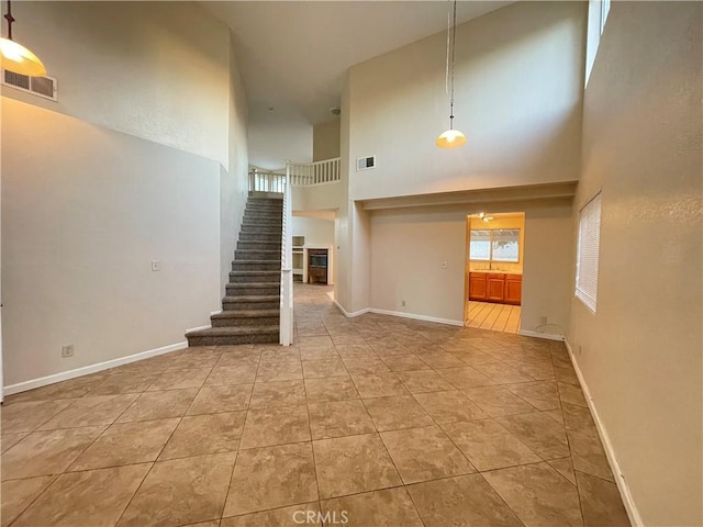 interior space featuring a high ceiling